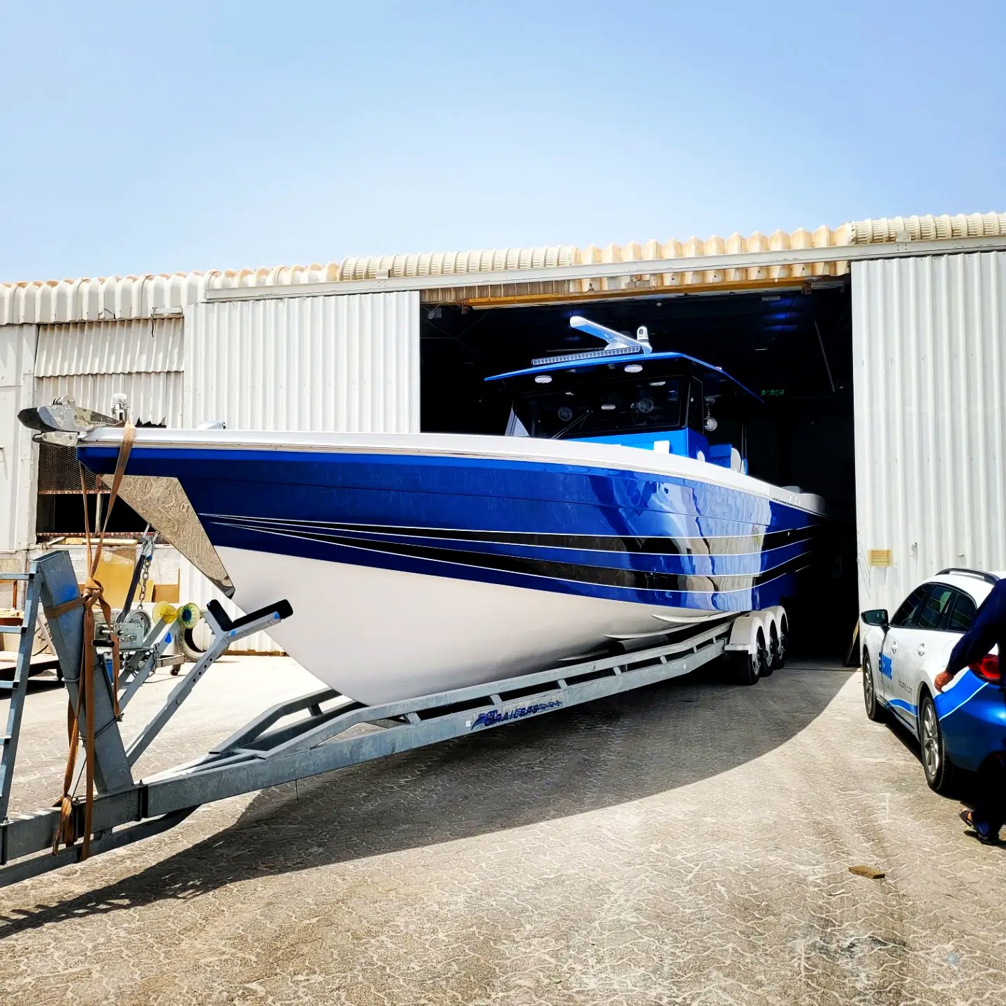 Fiberglass boat under construction at KHA Marine workshop
