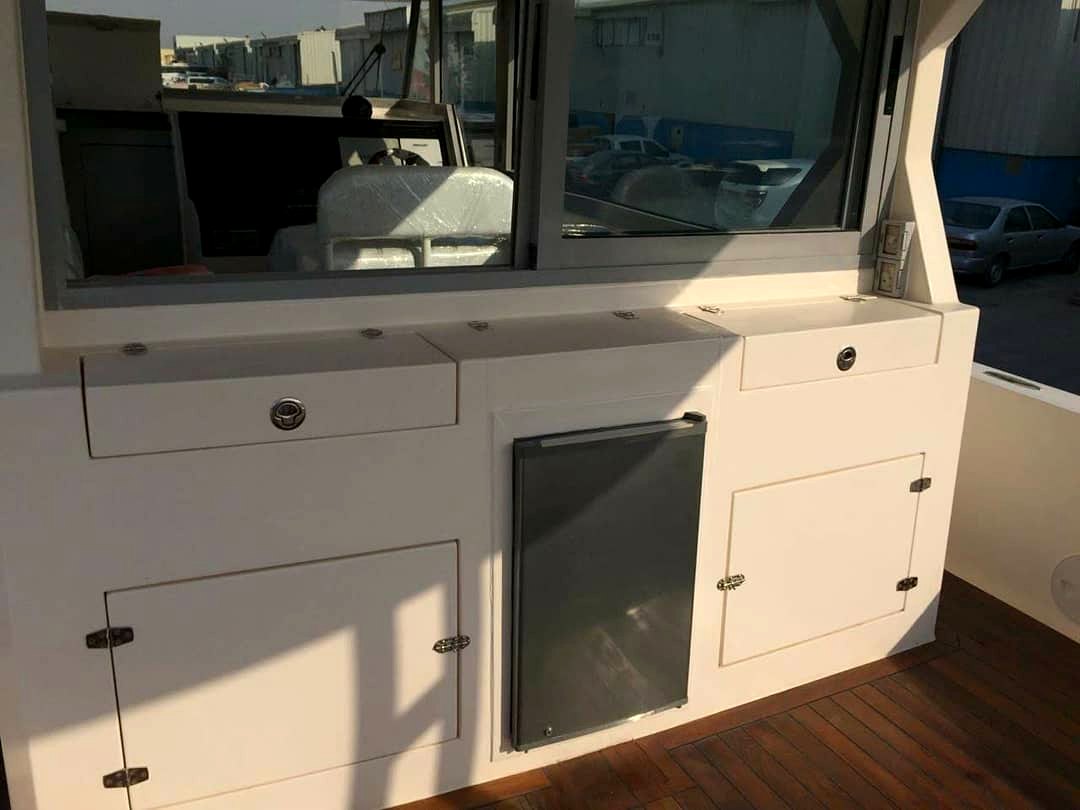 Custom cabin interior cabinetry and refrigeration