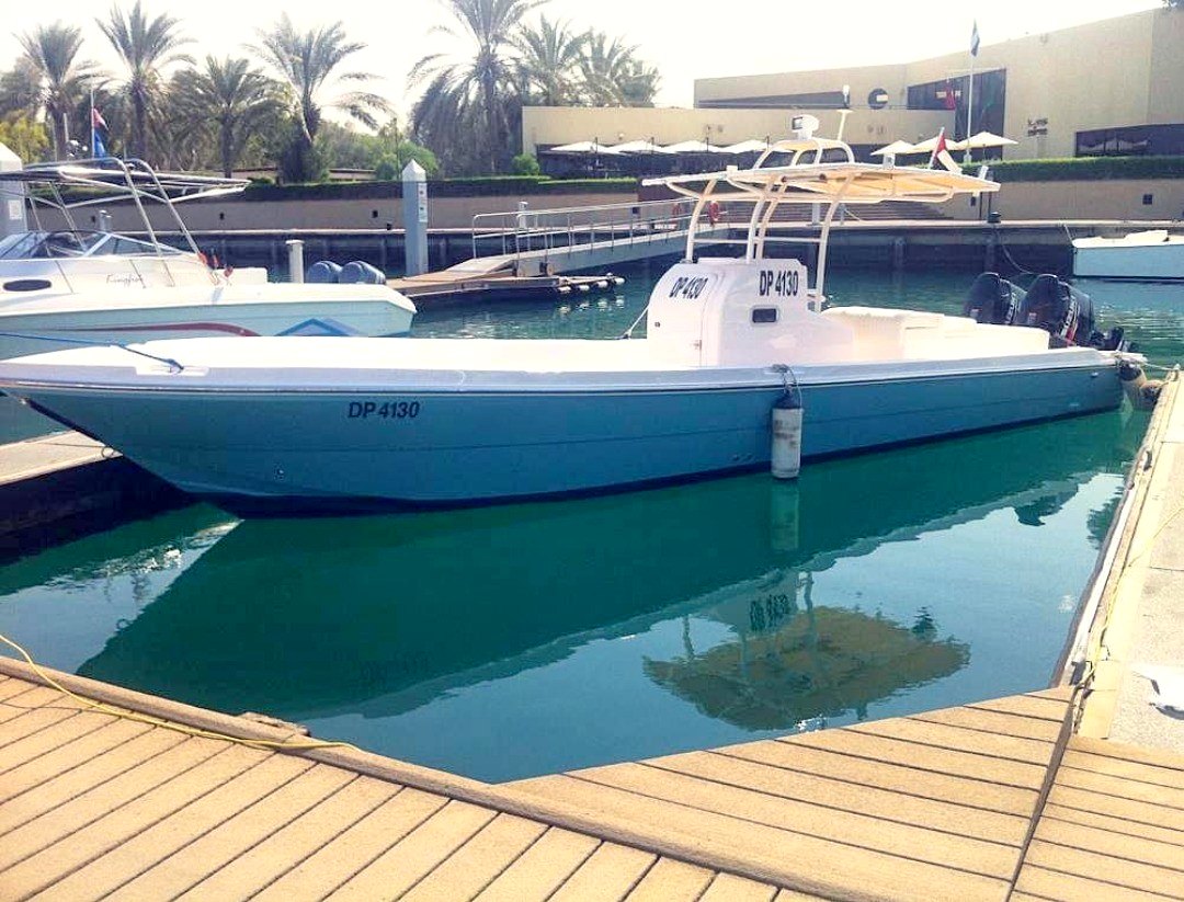 White workboat utility platform at marina